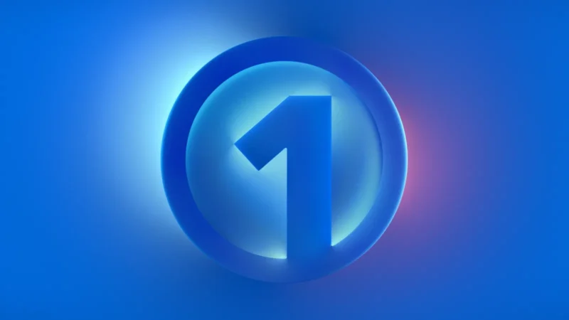 Il logo di Meta One, un numero 1 dentro un cerchio su sfondo blu