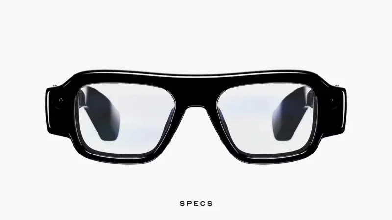 Snap Specs visti di fronte, montatura nera con le lenti trasparenti